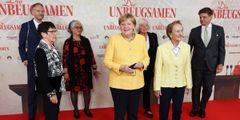 Merkels Laschet-Moment? Kanzlerin zeigt sich gut gelaunt auf Rotem Teppich